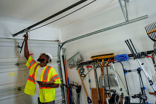 Professional Garage Door technician working in Martin's Additions, MD